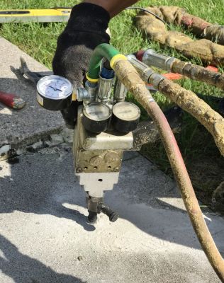 Concrete leveling equipment in action